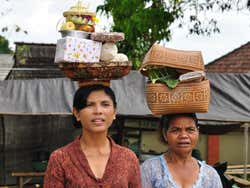 Women taking offerings to a temple